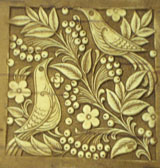 Birds and rowan berries stamped into a birch bark mirror case